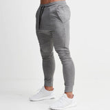 2019 Fashion Men Gyms Pants Joggers Fitness Casual Long Pants Men Workout Skinny Sweatpants Jogger Tracksuit Cotton Trousers